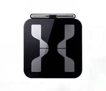 Hume Pod 2.0 smart scale in matte black with metal foot sensors and hand grip